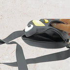 Side view of the portable bag for girls, revealing its compact yet spacious design for small essentials.