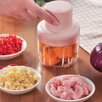 Top-down view of the Electric Mini Garlic Chopper with its lid and sharp stainless steel blade.