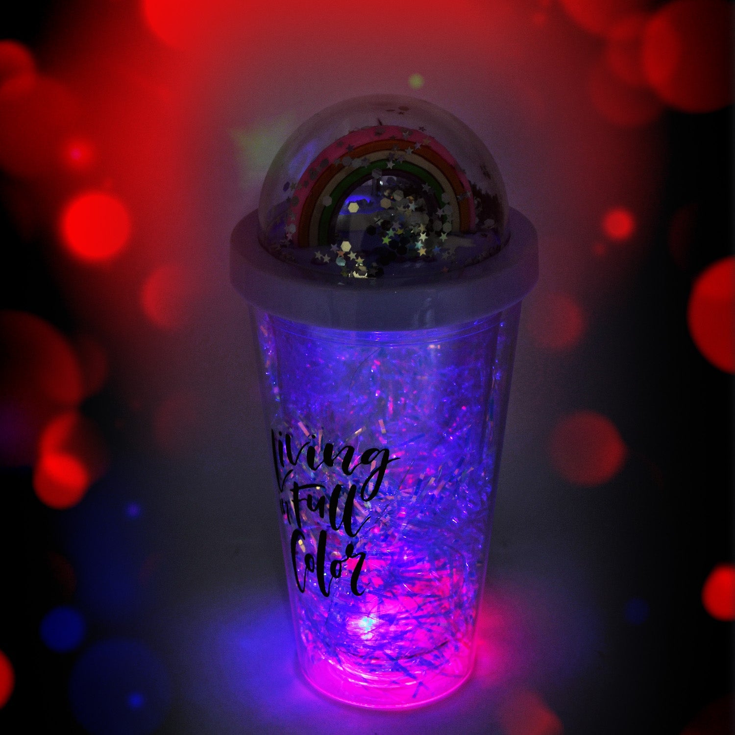 Side view of the portable water bottle for children with a glowing straw.