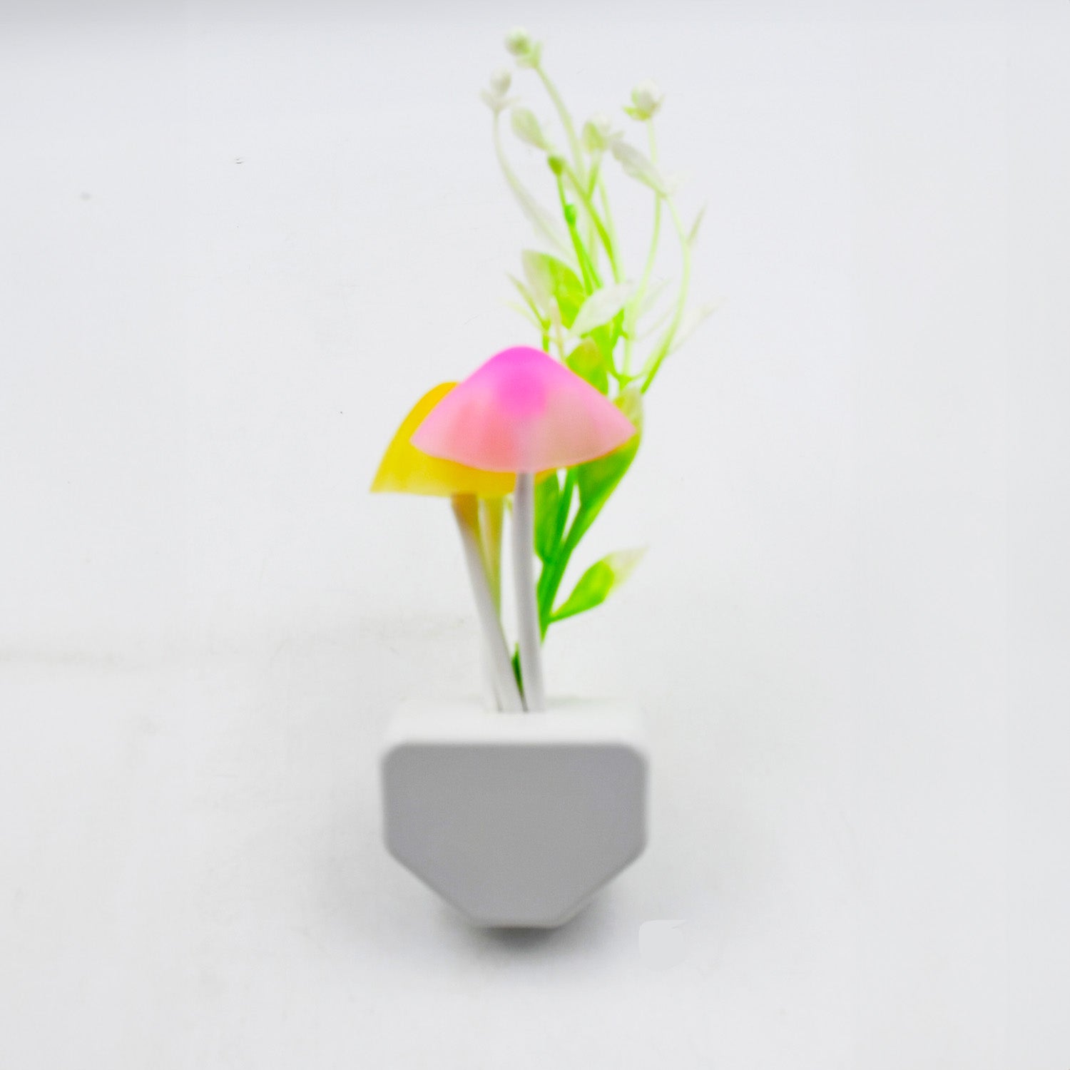 Mushroom night light in a child's bedroom, demonstrating its soft LED glow.