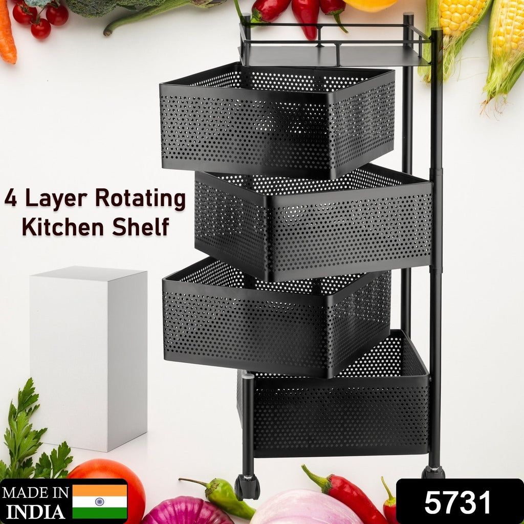 Close-up of the rotating metal mesh basket on the kitchen trolley, showing its ventilation.
