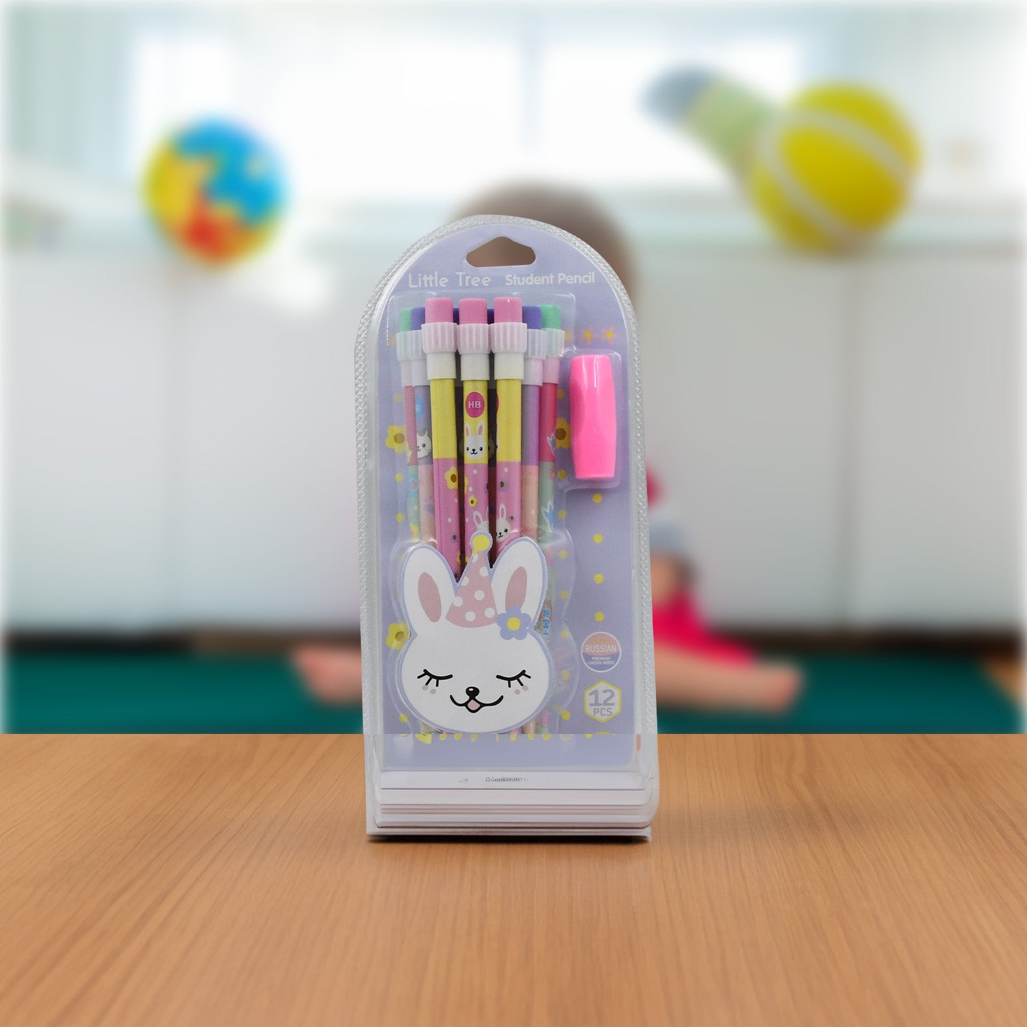 The cute rabbit and bear pencils arranged creatively, highlighting their vibrant colors.