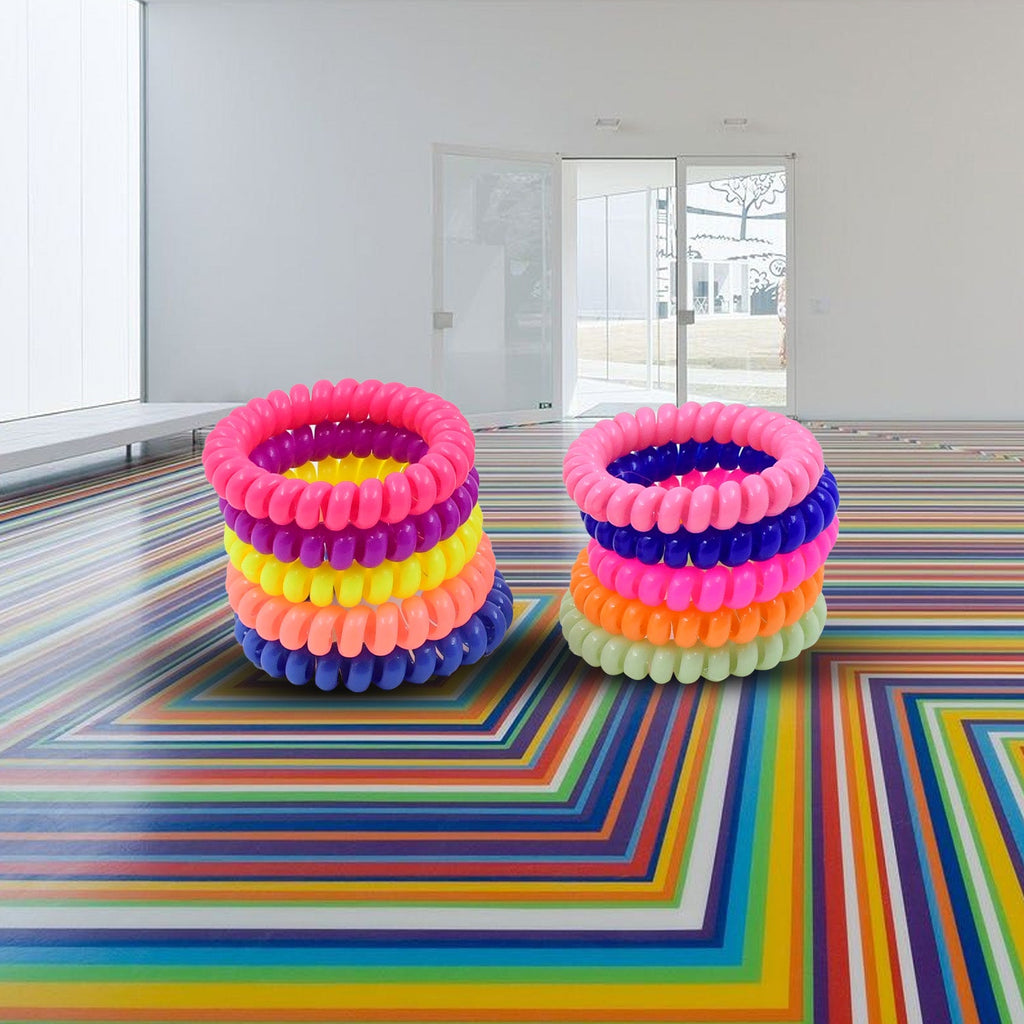 Flexible and strong telephone wire hair ties in various shades.
