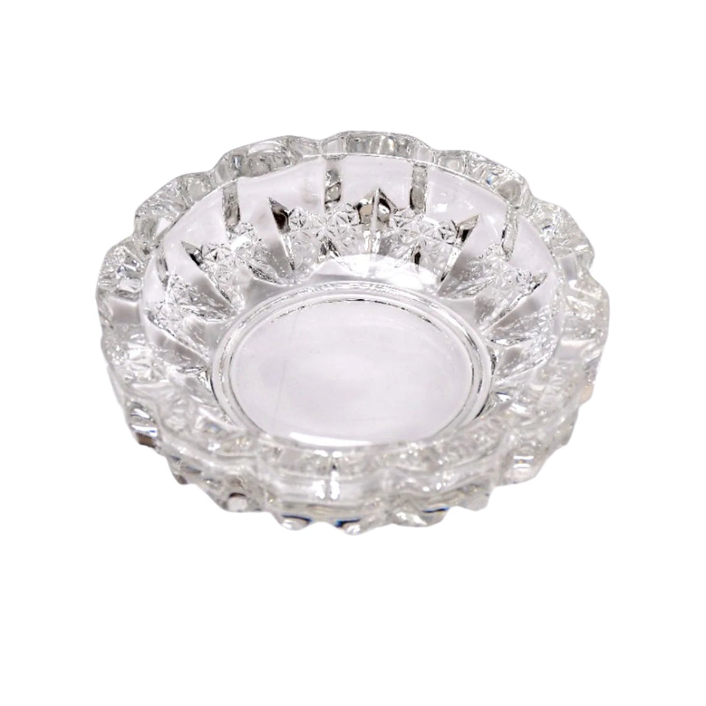 Versatile glass ashtray with multiple slots, suitable for both cigars and cigarettes.