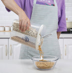 Close-up of the Organivo 4 section kitchen storage jar, highlighting the individual compartments and easy-pour dispenser.