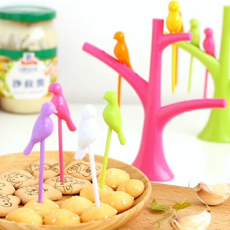 Bird fruit forks in a clear box, ready for gifting or storage.