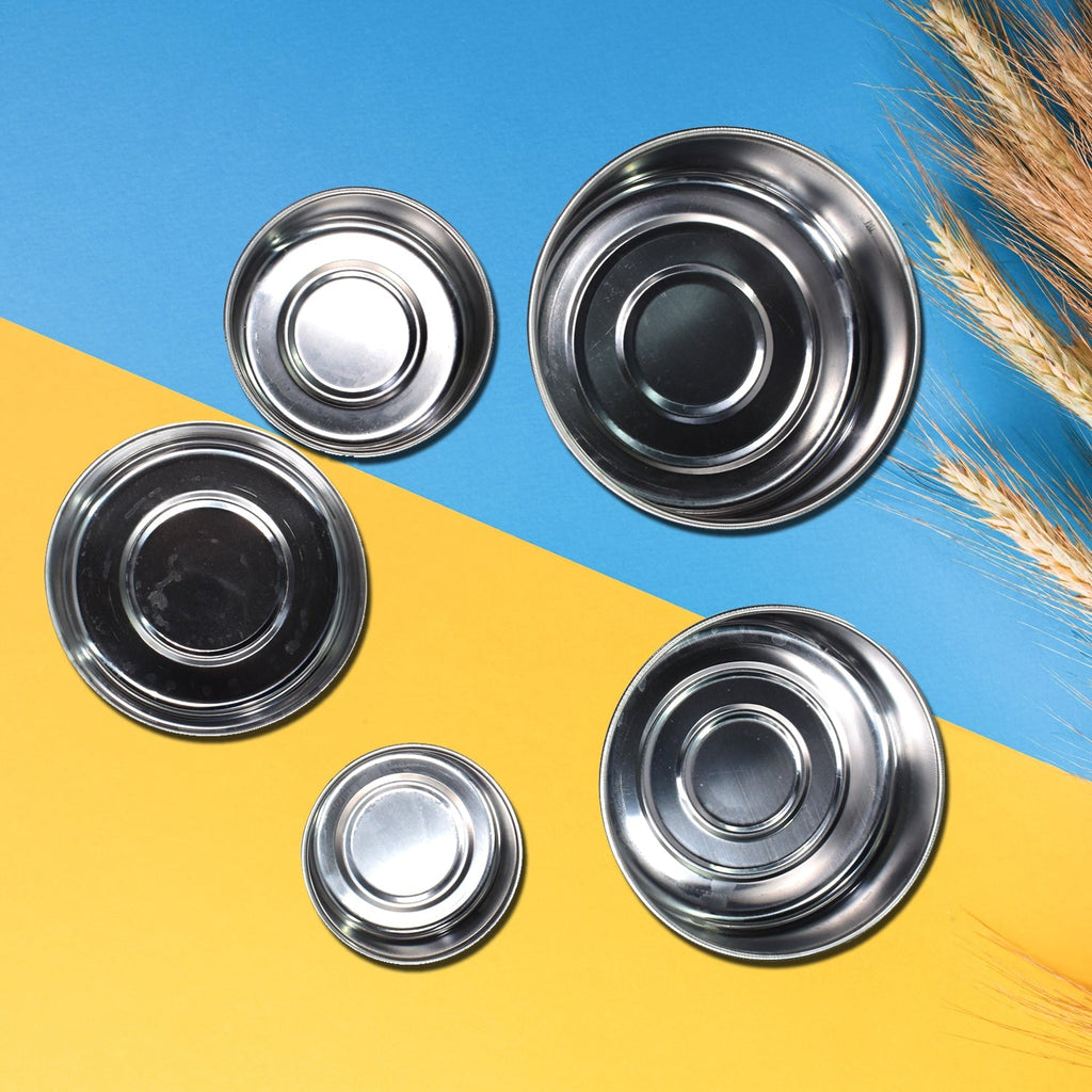 Stainless steel lunch box set with vibrant lids, ideal for daily meals.
