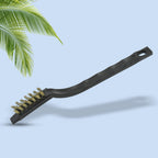 Ergonomic handle of a mini wire brush, showing comfortable grip and hanging hole.