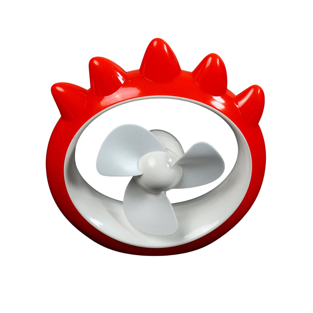 Portable mini desk fan in use on table