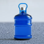 Portable plastic water bottle carrier handle designed for lifting heavy jugs