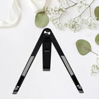 A sleek black foldable tablet stand holding a tablet at an ergonomic viewing angle.