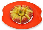 An apple being perfectly sliced into 8 pieces by the Quickslice apple corer.