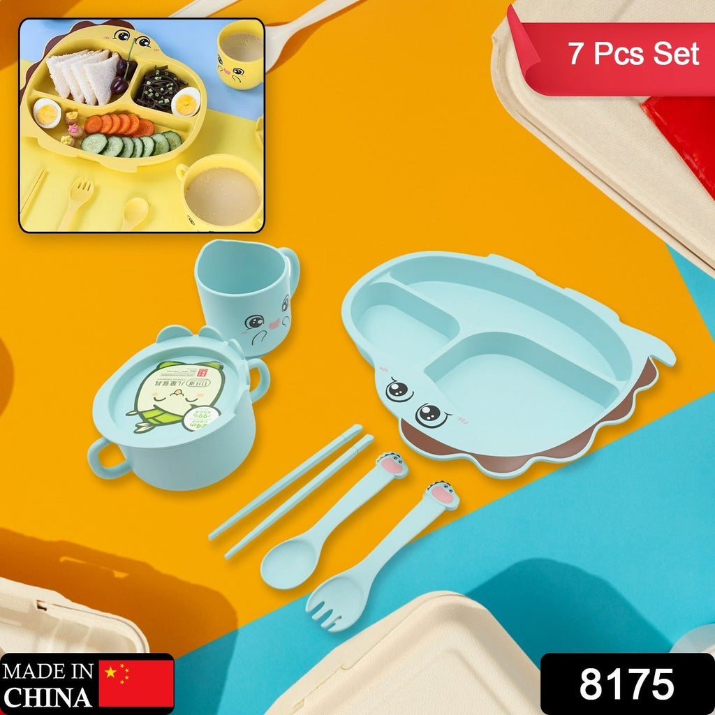 Components of the bamboo fibre feeding set laid out, showing the plate, bowl, mug, and cutlery.
