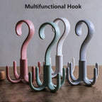 Close-up of the GlimmerHome 4-claw purse hanger hook, highlighting its robust construction.