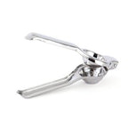 Compact and easy-to-store stainless steel lemon squeezer displayed in a kitchen.