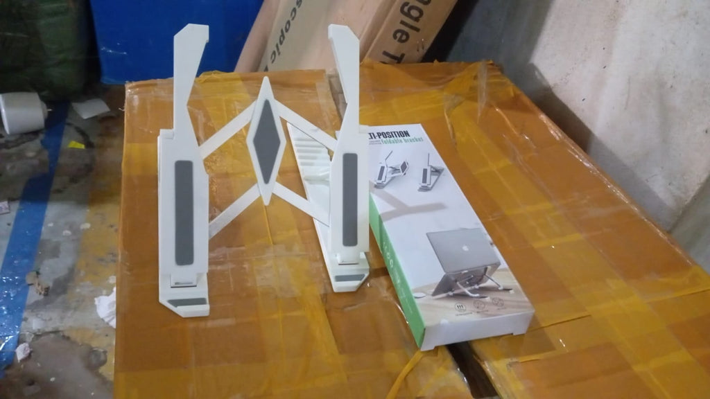 Lifestyle shot of the adjustable mobile stand in use, improving desk ergonomics.