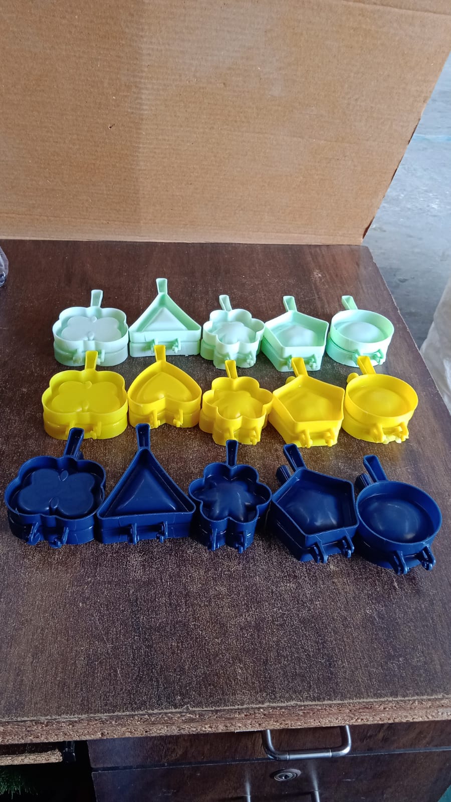 Assorted plastic snack moulds displayed for bakery and home kitchen use.