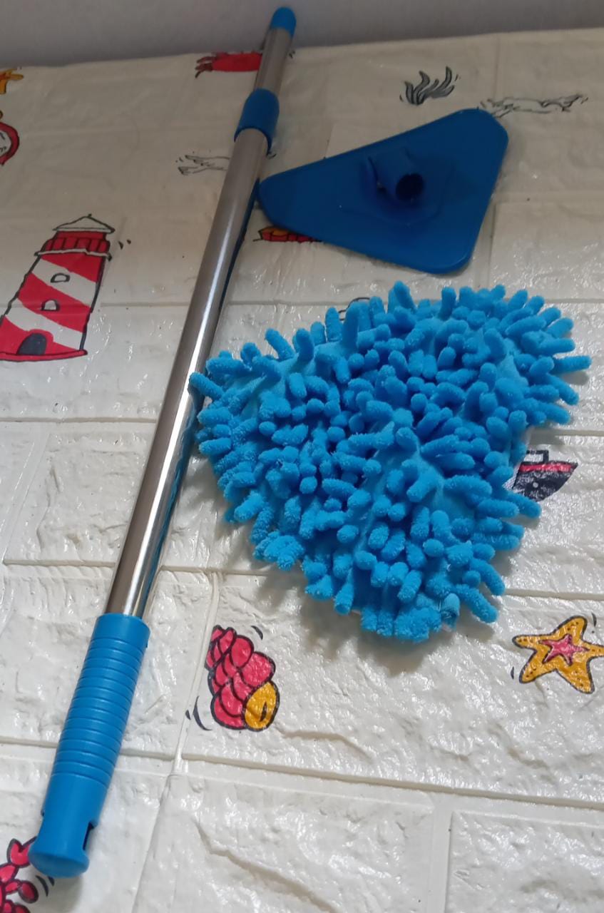 The complete Velvet Wipe triangle mop with its extendable handle ready for use.