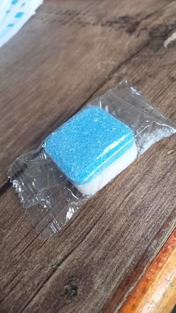 Compact washing machine cleaner tablet for convenient storage.