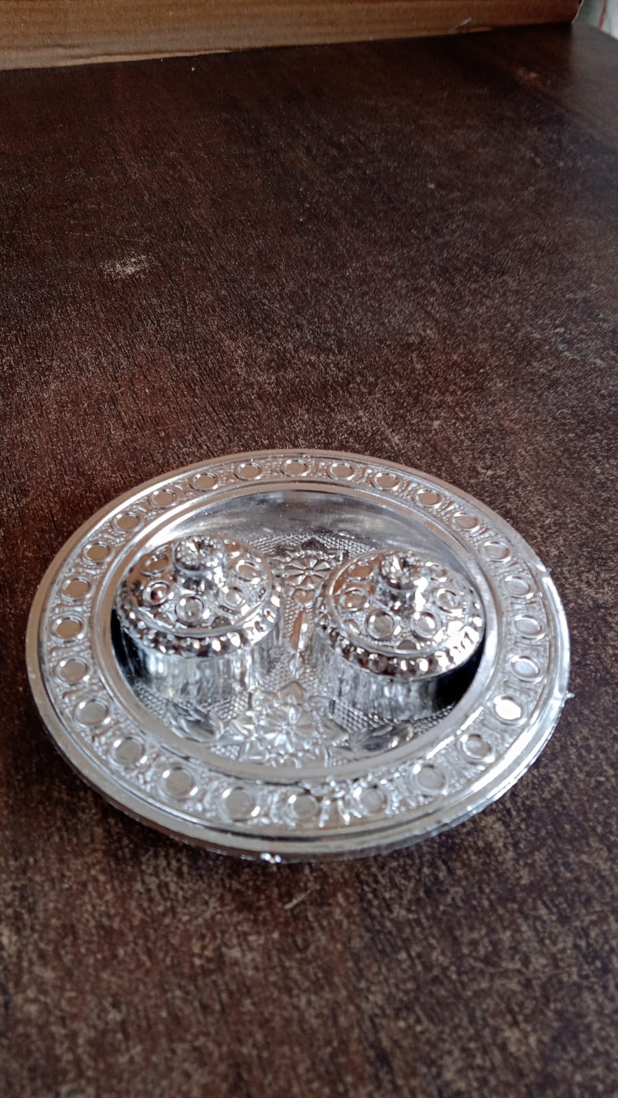 Retail packaging for the individual Kumkum Thali Holder.