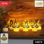 Set of 12 golden LED tealight candles shaped like diyas arranged