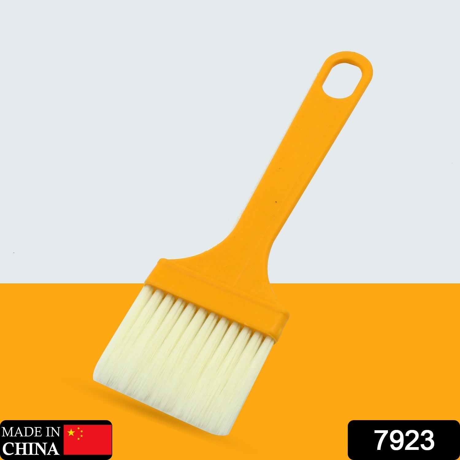 Flexible silicone pastry brush used for glazing baked goods.