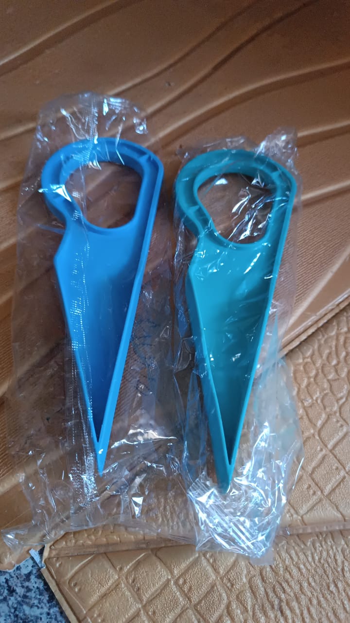 Compact mattress lifter tool shown in hand highlighting portability