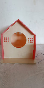 Natural wooden bird house for small garden birds, a charming addition to any outdoor setting.