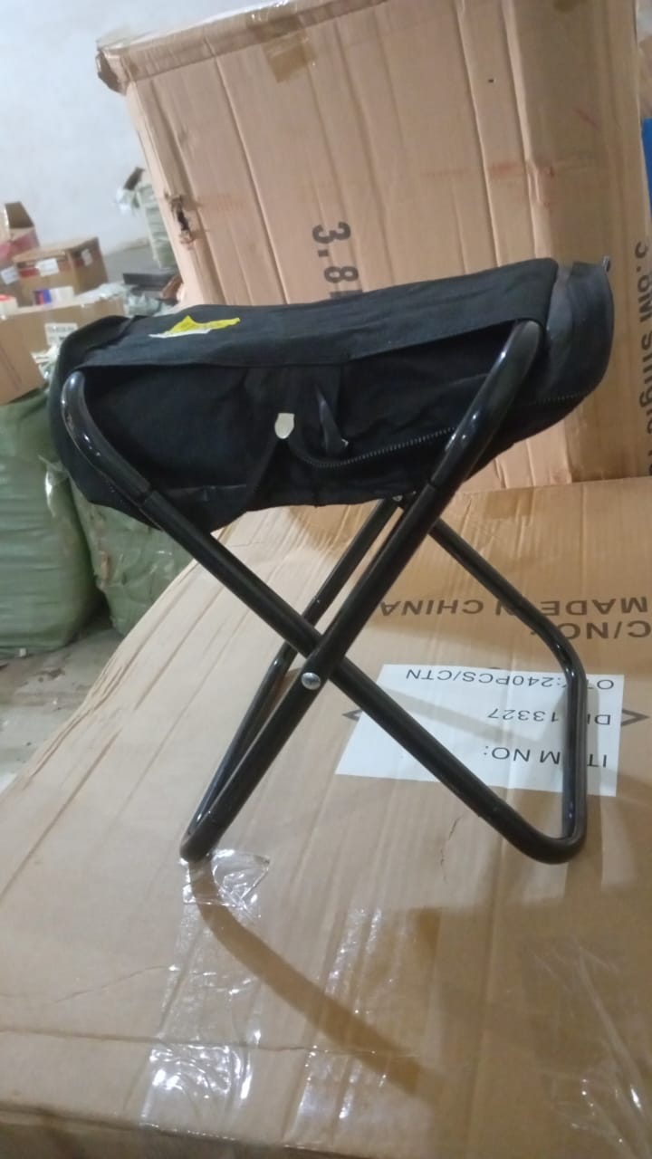 Close-up of the durable Oxford cloth seat and aluminium alloy frame of the folding camping stool.
