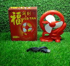USB-powered cooling fan in red, perfect for any workspace or home environment.