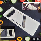 Fresh vegetables like carrots and cucumbers being sliced by the kitchen tool.