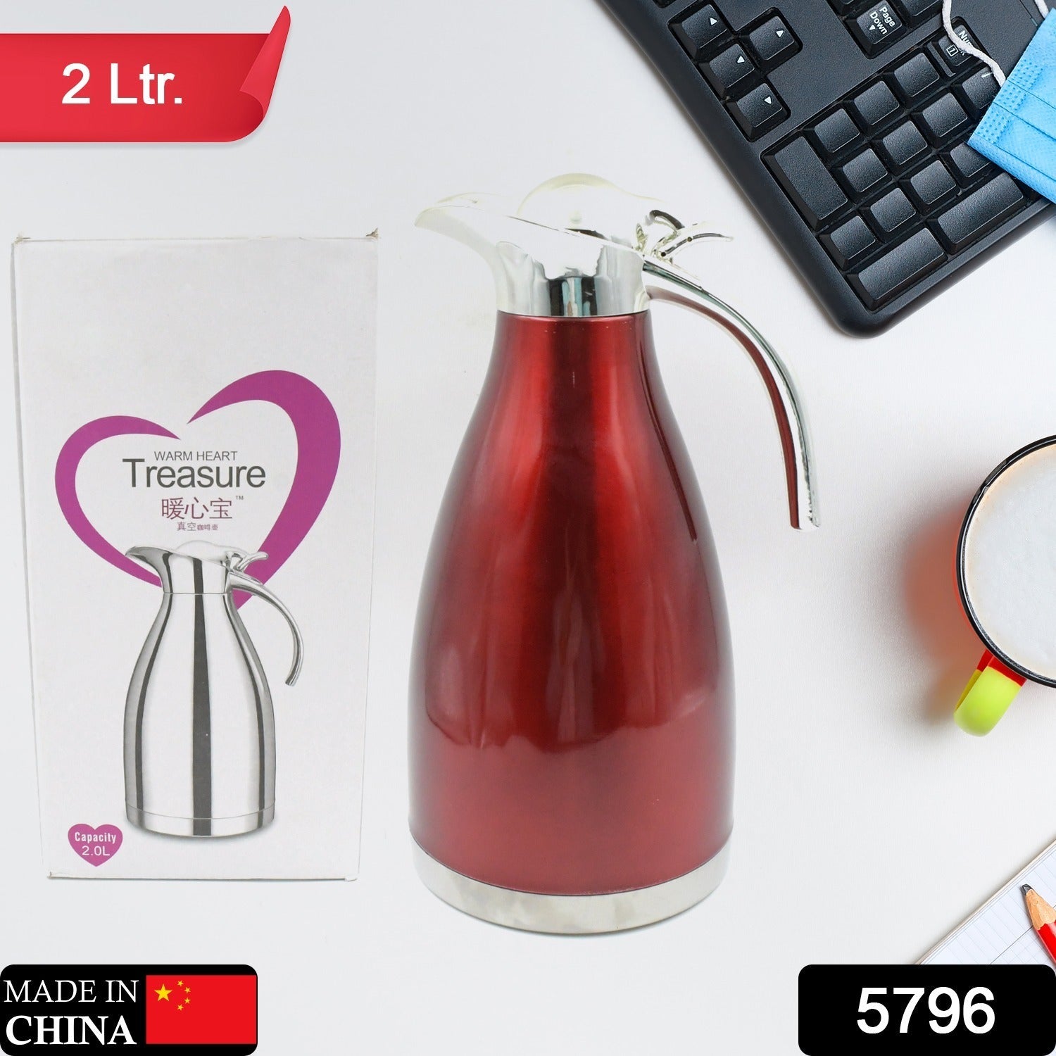 Ergonomic 2L stainless steel vacuum jug with one-hand pour mechanism.