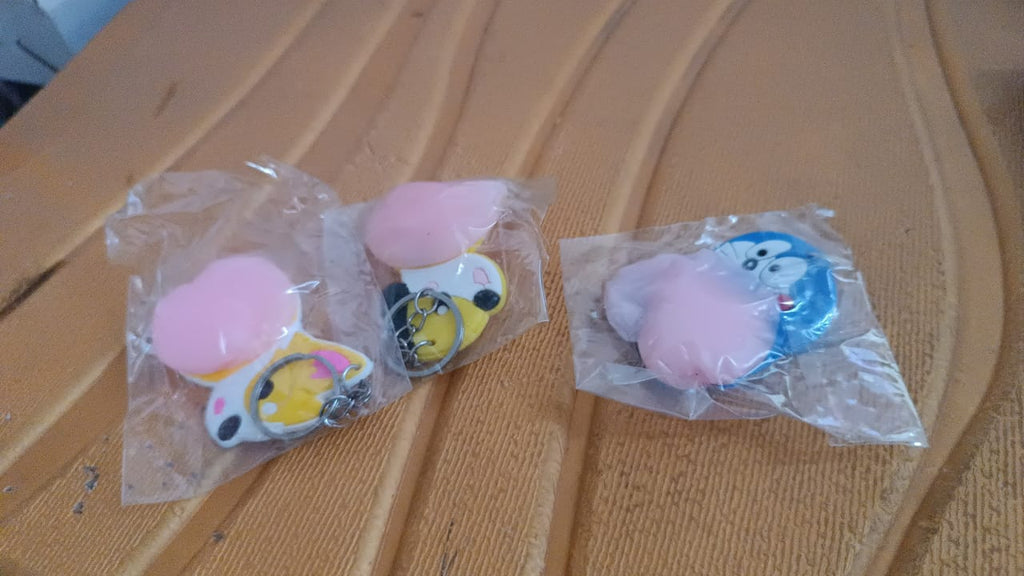 Cartoon Animal Butt Squeeze Keychain with assorted cute designs