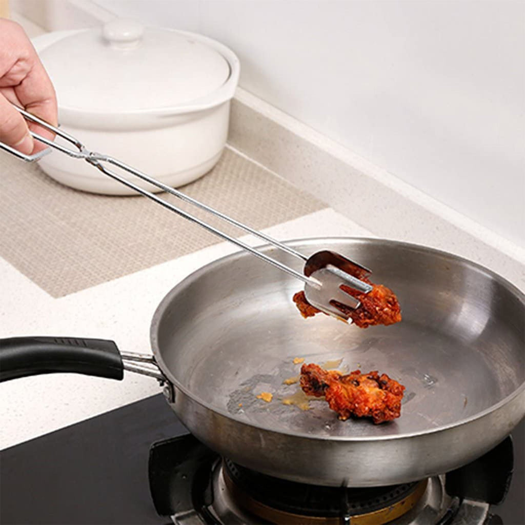 Durable cooking tong ideal for serving food at a buffet.