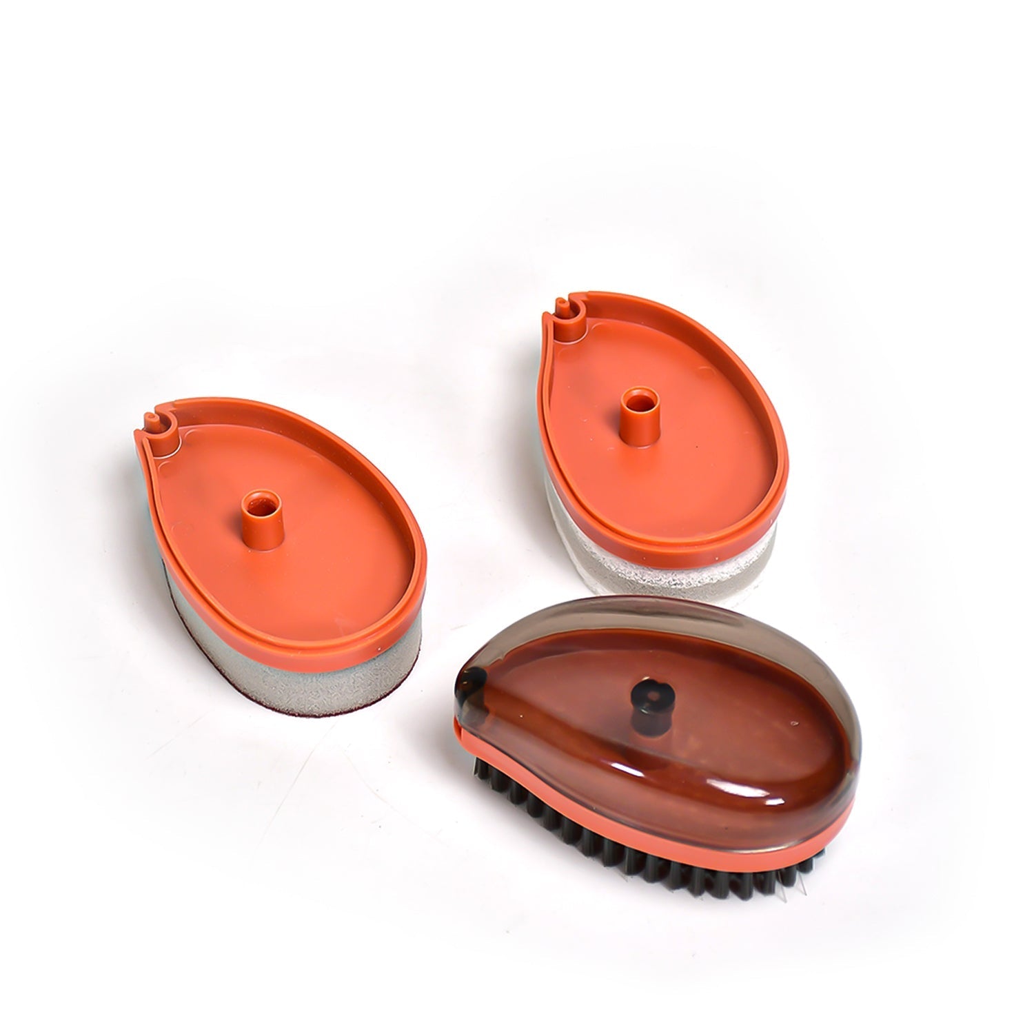Compact wet and dry brush removing dirt from a fabric item.