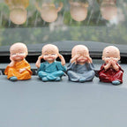 Baby Buddha 4-piece statue set displayed for home decoration