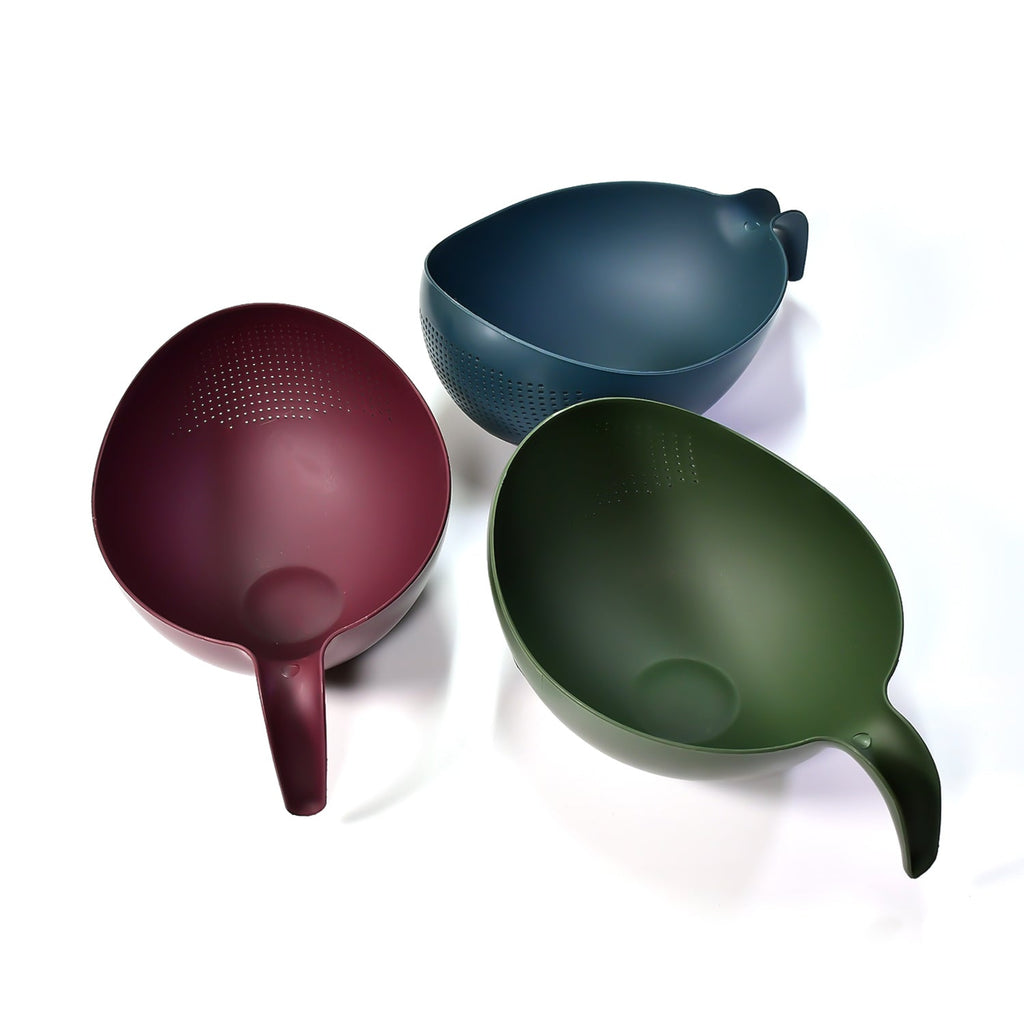 Three multi-purpose plastic strainers ready for various kitchen tasks.