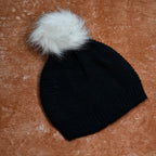 Unisex slouchy beanie cap in black with a skull design and warm fur lining.