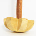 Dabster wooden blender for efficient food preparation in an Indian kitchen.
