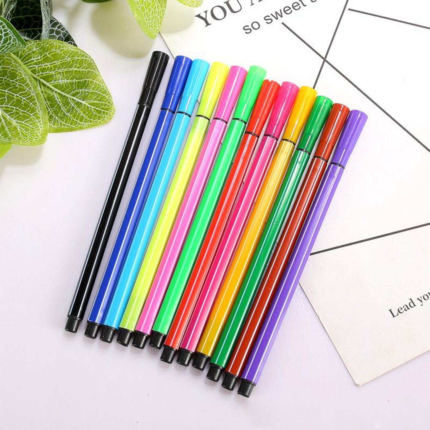 Open Minions-themed pen case revealing colorful sketch pens, perfect for children's art supplies.
