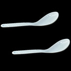 Neatly arranged 32-piece plastic tableware set, ideal for serving meals.