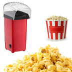 Electric popcorn maker machine preparing oil-free snacks for home.