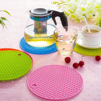 A versatile silicone hot mat laid flat, ready to protect surfaces from heat.