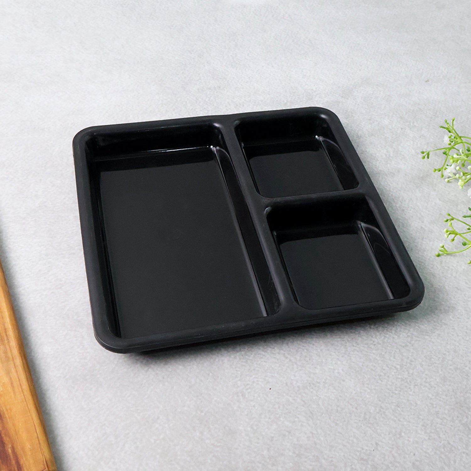 Easy-to-clean plastic meal tray with three divided sections