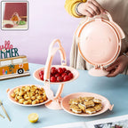 3-layer foldable snack serving stand with round trays displaying fruits and snacks