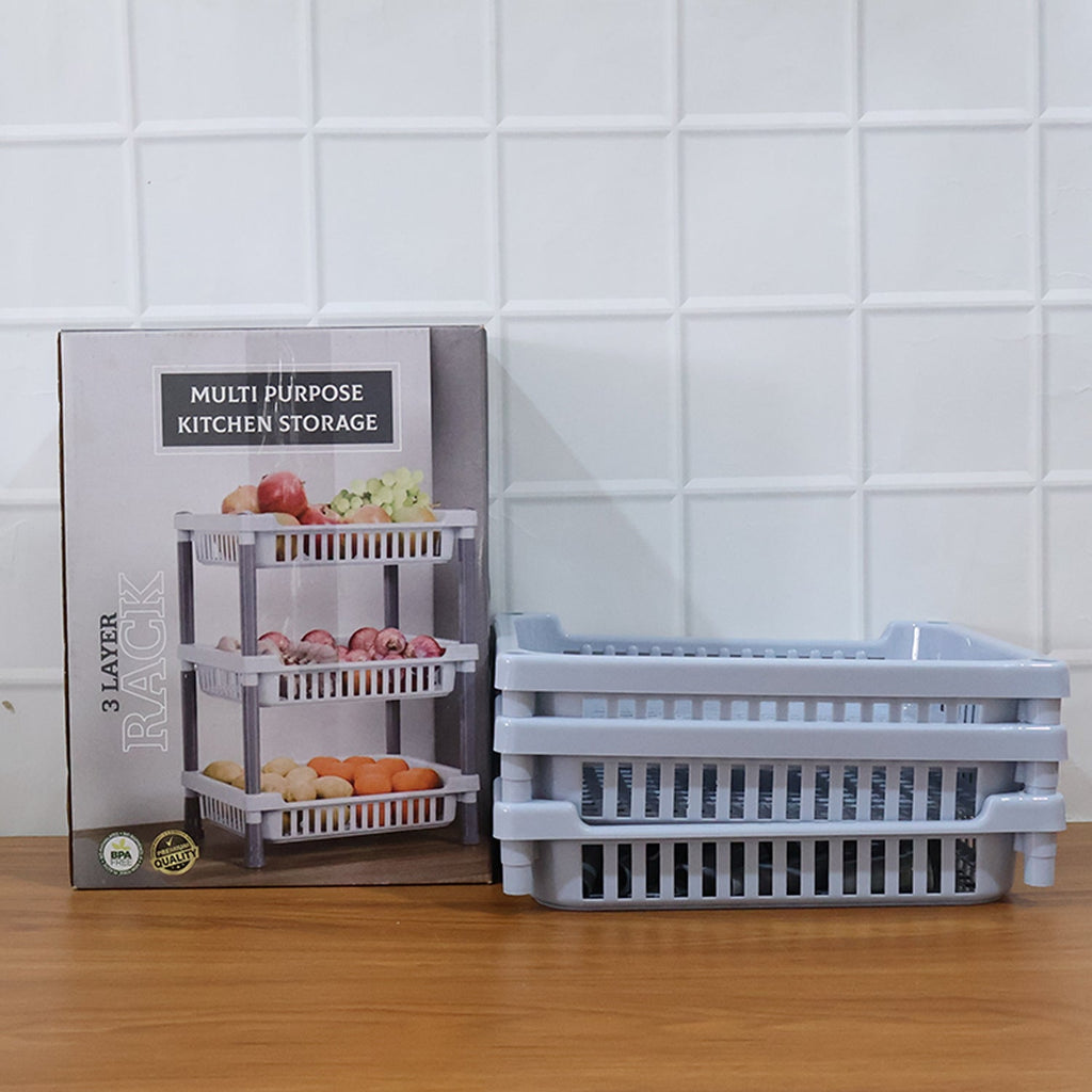 Compact kitchen storage rack with ventilated baskets for airflow