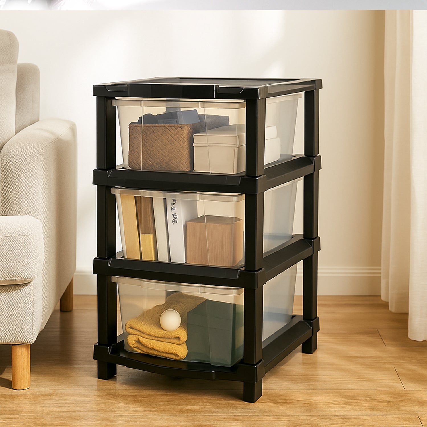Clear plastic storage drawer organizer with three pull-out bins