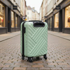 Side view of a durable and lightweight ABS luggage piece with strong zippers.
