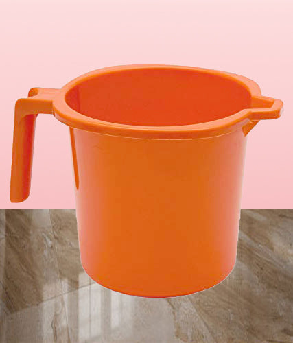 Close-up of the Bathora plastic bathroom mug's sturdy handle and vibrant color.