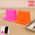 Mobile phone stand showing angled plastic support in use